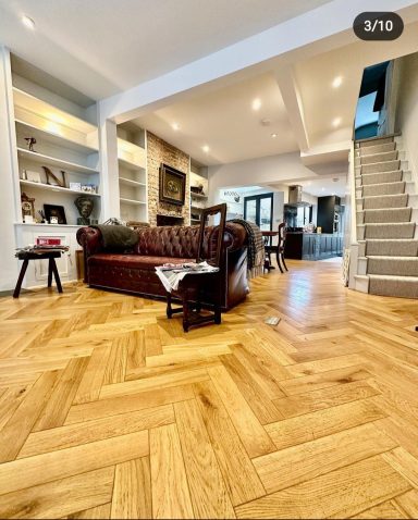 Open plan lounge, with herringbone oak flooring